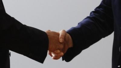 Two people shaking hands