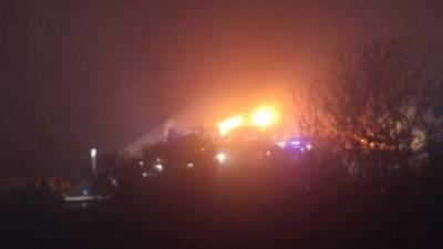 Flames on M5 motorway, seen from fields