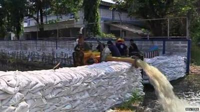 Flood water is pumped in Bangkok