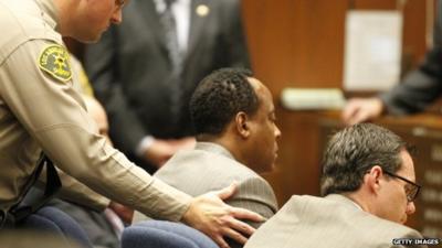 A Los Angeles County Sheriff"s Deputy remands Dr. Conrad Murray