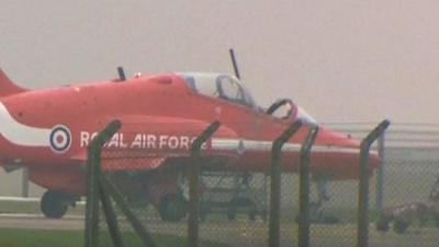 Red Arrows plane with missing cockpit canopy