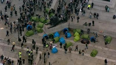 Tents put up at base of Nelson's Column in Trafalgar Square, London