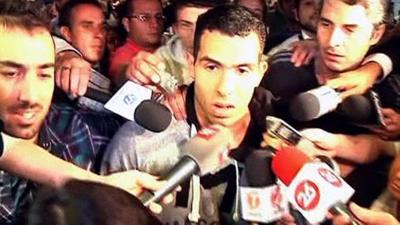 Carlos Tevez arrives in Argentina