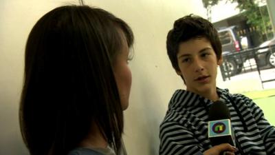 Leah interviewing a boy