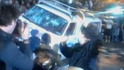 Penn State students attack a news van