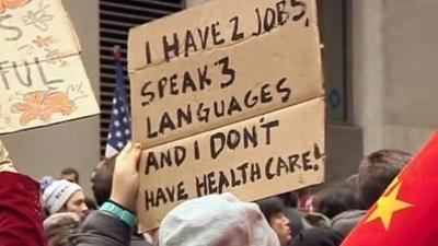 Protesters holding placards in New York