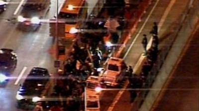 Demonstrators crossing Brooklyn Bridge