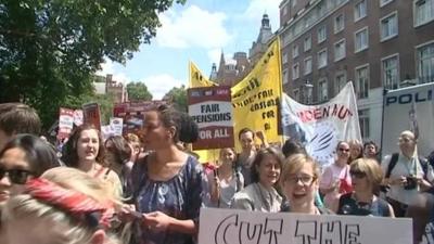 Demonstrators at earlier cuts protest.