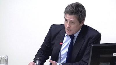 Actor Hugh Grant gives evidence at the Leveson phone hacking inquiry