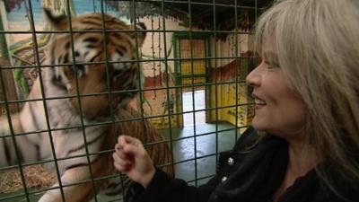 Sam Fox with tiger