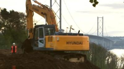 Digger works on bridge contruction