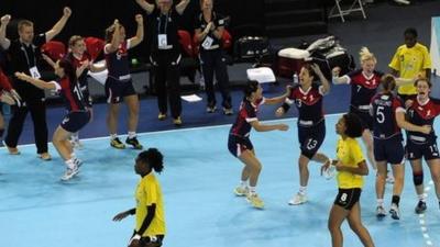 Great Britain's players celebrate victory over Angola