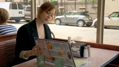 Suzanne Vega in the restaurant where she wrote Tom's Diner