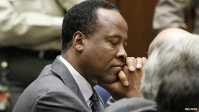 Dr. Conrad Murray closes his eyes after he was sentenced to four years