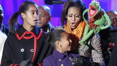 Michelle Obama with daughters and Kermit the frog
