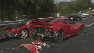 Two of the crashed supercars