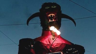 Devil figure burns in Guatemala