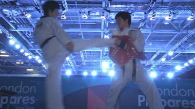 Taekwondo fighters demonstrate the new technology