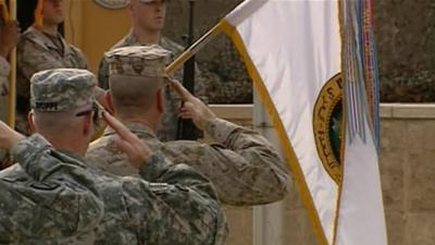 Soldiers with US flag in Baghdad