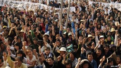 Residents of Wukan attend a rally