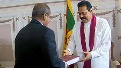 President Mahinda Rajapaksa receives the report