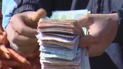 Man counting banknotes