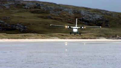 Plane flying above Barra