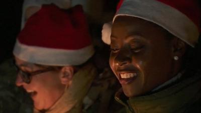 British service women singing carols in Camp Bastion