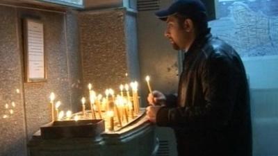 A Christian remembering the victims of the church attack