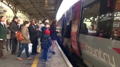 Train and passengers on platform