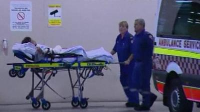 Shark attack victim being taken to hospital