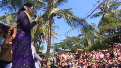 Aung San Suu Kyi addressing supporters