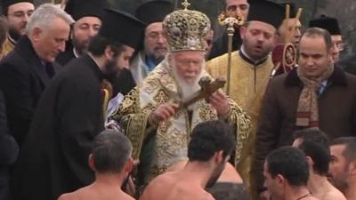 An archbishop after blessing the cross in Turkey