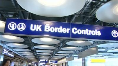 UK Border Controls sign at airport