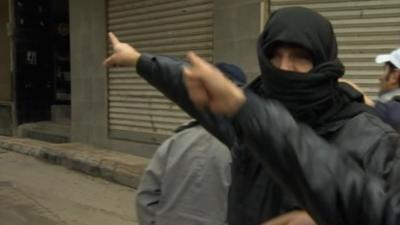 Men in street in Syria