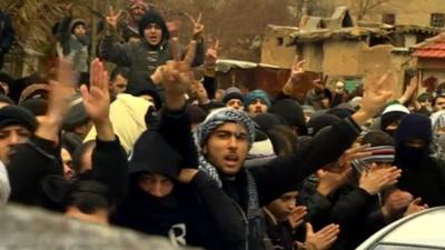 Anti-Assad demonstrators in the Damascus suburb of Saqba