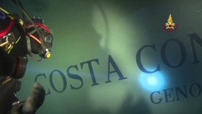 Diver inspects Costa Concordia hull