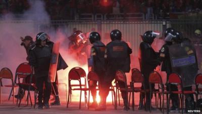 Riot police inside the stadium