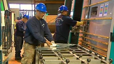 Workmen in a US factory