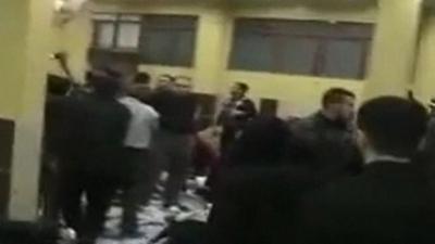 Unverified amateur footage appears to show chaotic scenes as the injured are treated