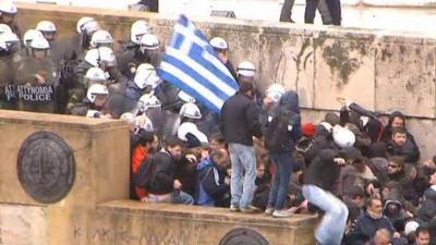 Police and protesters clash in Athens