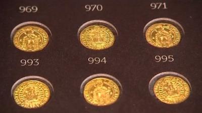 Gold coins on display in Poland