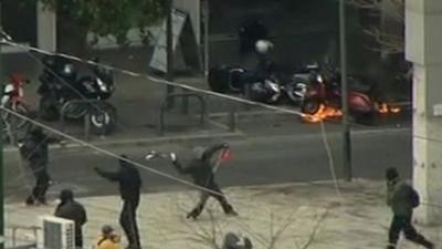 Petrol bombs were thrown at security forces in Athens.