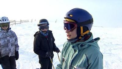 Skiers on a ski slope