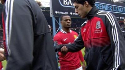 Suarez refuses Evra handshake