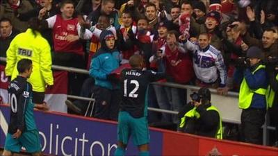 Thierry Henry celebrates with Arsenal's fans