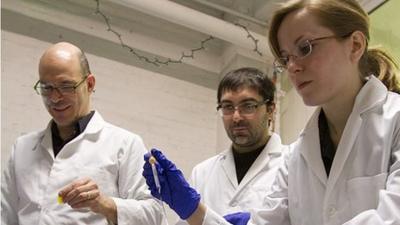 Amateur scientists holding vials