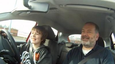 Young person learning to drive