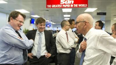 Rupert Murdoch pictured with staff members of The Sun