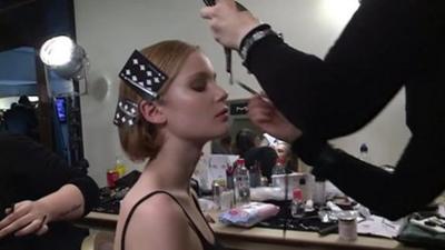 A model being made up at London Fashion Week